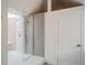 Updated bathroom features a glass shower with stylish tile and modern fixtures at 1165 N Pennsylvania St # 3B, Denver, CO 80203