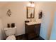 Bathroom with a modern vanity, mirror and fixtures at 1165 N Pennsylvania St # 3B, Denver, CO 80203