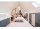 Bright kitchen features a large island with cooktop, pendant lighting, and an open layout with easy access to dining and living areas at 1165 N Pennsylvania St # 3B, Denver, CO 80203