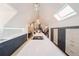 Beautiful kitchen featuring quartz countertops, a large island with cooktop, pendant lights, and easy access to dining and living areas at 1165 N Pennsylvania St # 3B, Denver, CO 80203