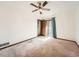 Bedroom featuring a ceiling fan and sliding door to the exterior at 9477 W 89Th Cir, Broomfield, CO 80021