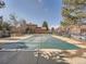 View of the neighborhood pool closed for the season and covered with a tarp at 9477 W 89Th Cir, Broomfield, CO 80021