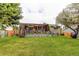 Lush backyard with a patio area and a well-maintained lawn at 6120 W 111Th Ave, Westminster, CO 80020