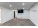 Finished basement with recessed lights, tv and neutral walls and carpeted floor at 6120 W 111Th Ave, Westminster, CO 80020