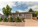 Charming single-story home with well-kept landscaping, inviting curb appeal at 6120 W 111Th Ave, Westminster, CO 80020