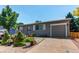 Charming single-story home with well-maintained landscaping and an attached one car garage at 6120 W 111Th Ave, Westminster, CO 80020