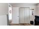 Hallway view with storage closet, neutral walls, and access to rooms ensuring practicality and flow at 6120 W 111Th Ave, Westminster, CO 80020