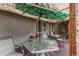 Inviting covered patio with outdoor seating and lattice shade, perfect for outdoor entertaining and relaxation at 6120 W 111Th Ave, Westminster, CO 80020