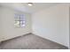 Simple bedroom with a window and neutral carpet at 1218 Ascot Ave, Highlands Ranch, CO 80126