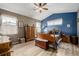Spacious bedroom features a ceiling fan, neutral colors, and ample closet space at 13263 Niwot Trl, Broomfield, CO 80020