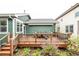Enjoy al fresco dining on this spacious deck, complete with outdoor seating, an awning and beautifully landscaped surroundings at 13263 Niwot Trl, Broomfield, CO 80020