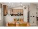 Modern kitchen with stainless steel appliances and wood cabinets at 13263 Niwot Trl, Broomfield, CO 80020
