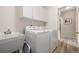 Laundry room with modern washer and dryer at 13263 Niwot Trl, Broomfield, CO 80020