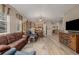 Open floorplan with a dining area, living room, and wood-style flooring at 13263 Niwot Trl, Broomfield, CO 80020