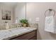 Bathroom boasts granite countertop and modern vanity at 6858 Johnson St, Arvada, CO 80004