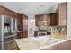 Modern kitchen with granite countertops, stainless steel appliances, and ample cabinetry at 6858 Johnson St, Arvada, CO 80004