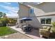 Patio with seating area and blue umbrella at 6858 Johnson St, Arvada, CO 80004