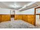 Basement area with wood paneling provides extra space for customization and storage at 2675 N Saint Paul St, Denver, CO 80205