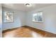 Bedroom with hardwood floors and two windows at 2675 N Saint Paul St, Denver, CO 80205