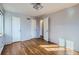 Spacious bedroom with hardwood floors and multiple closets at 2675 N Saint Paul St, Denver, CO 80205