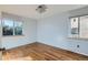 Bright bedroom with hardwood floors, and large windows offering natural light at 2675 N Saint Paul St, Denver, CO 80205