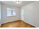 Bedroom with a window and hardwood floors at 2675 N Saint Paul St, Denver, CO 80205