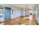 Spacious living room featuring gleaming hardwood floors and neutral wall, creating a bright and open space at 2675 N Saint Paul St, Denver, CO 80205