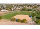 Aerial view of a well-maintained ball field with green grass and mature trees at 5319 Warrior St, Frederick, CO 80504