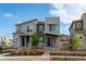 Charming two-story home featuring a modern design with stone accents and a well-manicured front yard at 5319 Warrior St, Frederick, CO 80504
