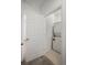Convenient laundry room features a stackable washer and dryer at 5319 Warrior St, Frederick, CO 80504