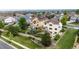 Aerial view of a neighborhood, highlighting the lush green lawns and beautiful backyard spaces at 22962 Briar Leaf Ave, Parker, CO 80138