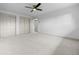 Spacious bedroom with plush carpeting, neutral walls, and closet space at 1000 Zang St, Golden, CO 80401