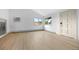 Bright, open living room with wood floors and large windows providing plenty of natural light at 1000 Zang St, Golden, CO 80401
