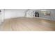 Spacious living area with wood floors and modern railings leading to upper level at 1000 Zang St, Golden, CO 80401