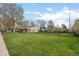 Expansive grassy yard surrounded by a wooden fence, offering ample outdoor space at 1000 Zang St, Golden, CO 80401