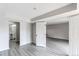 Bright bedroom has an en-suite bathroom and large doorway to living area at 4899 S Dudley St # 15B, Littleton, CO 80123