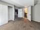 Open basement with a bathroom with a large closet space and an open entry at 4777 S Olathe St, Aurora, CO 80015