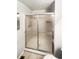 Bathroom featuring a shower with sliding glass doors at 1885 S Quebec Way # H27, Denver, CO 80231
