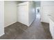 A spacious bedroom with gray carpet and a double-door closet for ample storage at 1885 S Quebec Way # H27, Denver, CO 80231