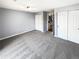 Spacious bedroom with carpet, ample closet space, and neutral paint at 1885 S Quebec Way # H27, Denver, CO 80231
