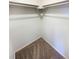 Corner of a walk-in closet with carpeted floor and white walls at 1885 S Quebec Way # H27, Denver, CO 80231