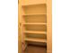 Walk-in closet with multiple built-in shelving units for optimal storage space at 3220 Boulder Cir # 103, Broomfield, CO 80023