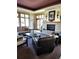 Relaxing lounge area with fireplace, seating, and natural light at 3220 Boulder Cir # 103, Broomfield, CO 80023