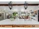 Kitchen featuring island, wooden beams, and an open floor plan at 19 Rock Ln, Castle Rock, CO 80104