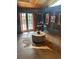 A cozy living room with dark walls, unique round coffee table, and charming decor at 19 Rock Ln, Castle Rock, CO 80104