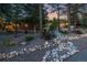 Gravel yard with unique rock and stone design elements surrounding a cozy home at 19 Rock Ln, Castle Rock, CO 80104
