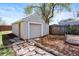 Detached garage with ample storage space and a well-kept exterior at 5612 Ammons St, Arvada, CO 80002