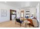 Cozy living room featuring a decorative fireplace and comfortable seating at 5612 Ammons St, Arvada, CO 80002