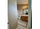 Bathroom featuring tile floors, single sink vanity, and shower stall at 19246 E Idaho Pl # 102, Aurora, CO 80017