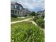 View of the community with green lawns, walkways, and neatly maintained landscaping at 19246 E Idaho Pl # 102, Aurora, CO 80017